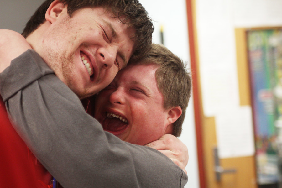 1st Place—Student Life, Kelsie Sneegas, SM North. "Demonstrating the bonds created in the special education department, Senior Caleb Willis hugs his para."