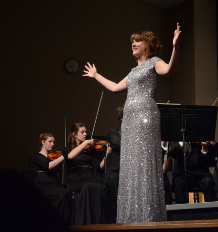 Singing a solo for the Master Works concert, senior Rose Smithson shows off her voice. Smithson had to learn an entire song in Italian to preform that night. phot by: Max Ramsay