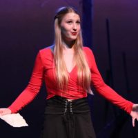 Reading a letter from her husband, Lady Macbeth, played by senior Kyra Tatge, describes Macbeth’s encounter with three witches. The theatre department performed “Macbeth” on Nov. 18-20 in the Performing Arts Center.