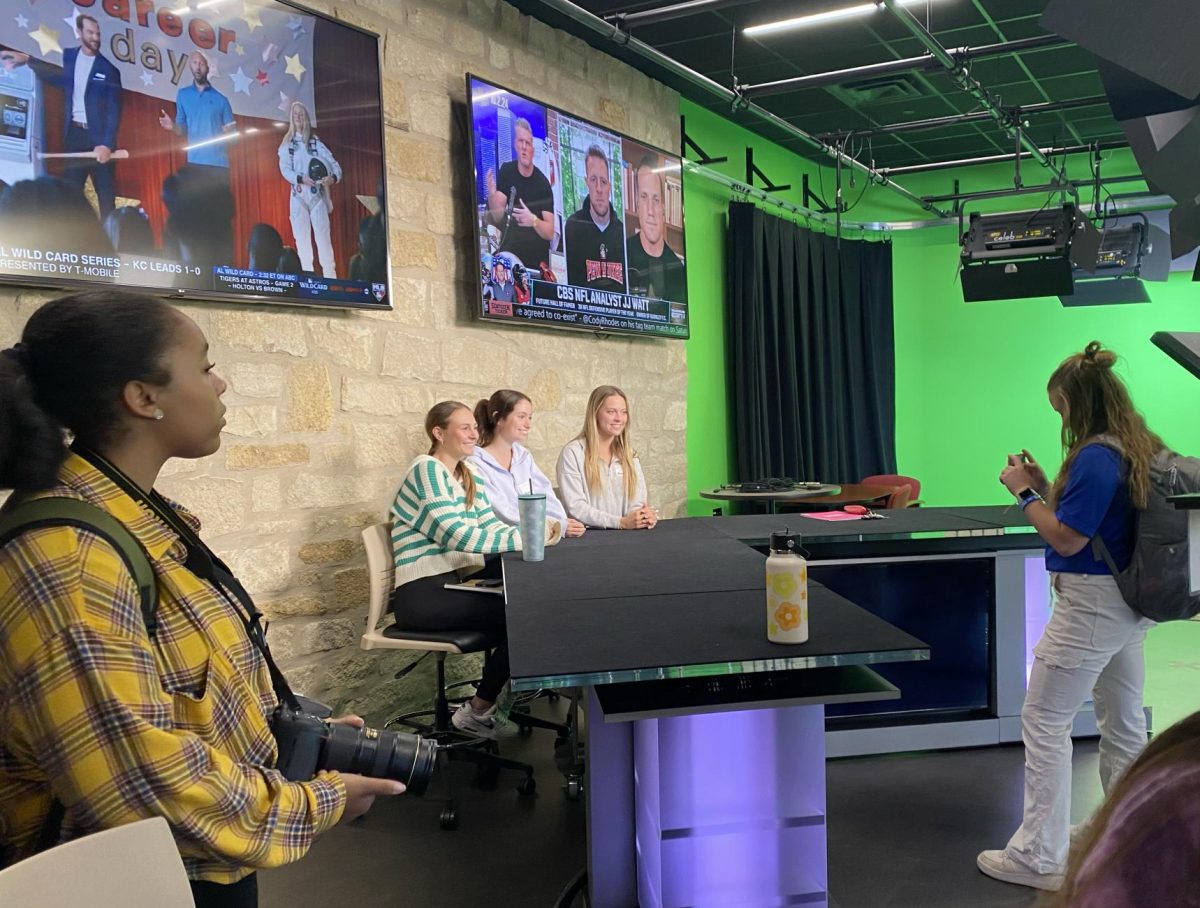 Students tour the William Allen White School of Journalism and Mass Communications during the 2024 fall conference.